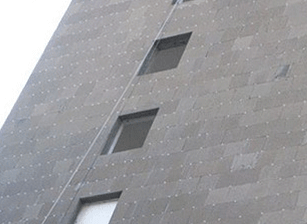 Exterior building wall insulation for fire protection.